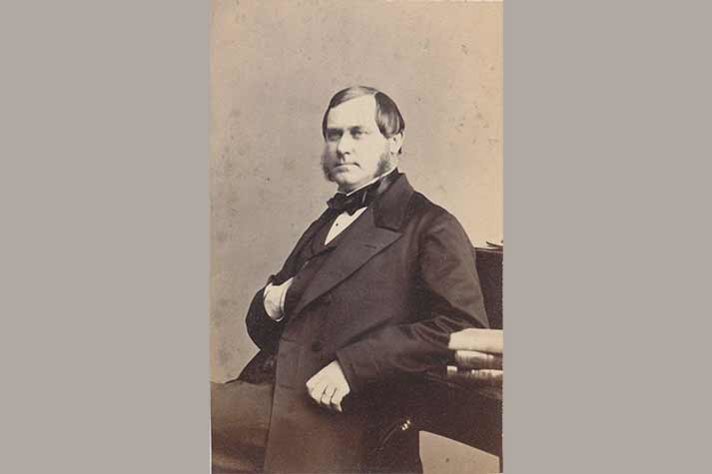 Louis De Geer d.ä. sitter vid ett skrivbord.