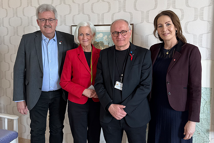 Gruppbild på fyra personer.