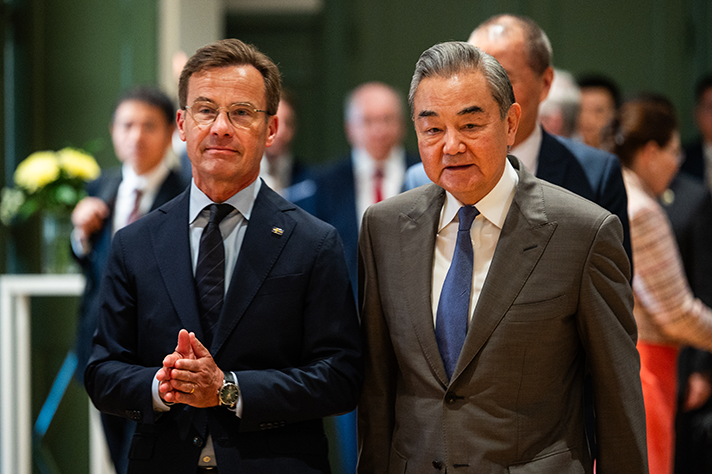 Statsminister Ulf Kristersson och Kinas utrikesminister Wang Yi.